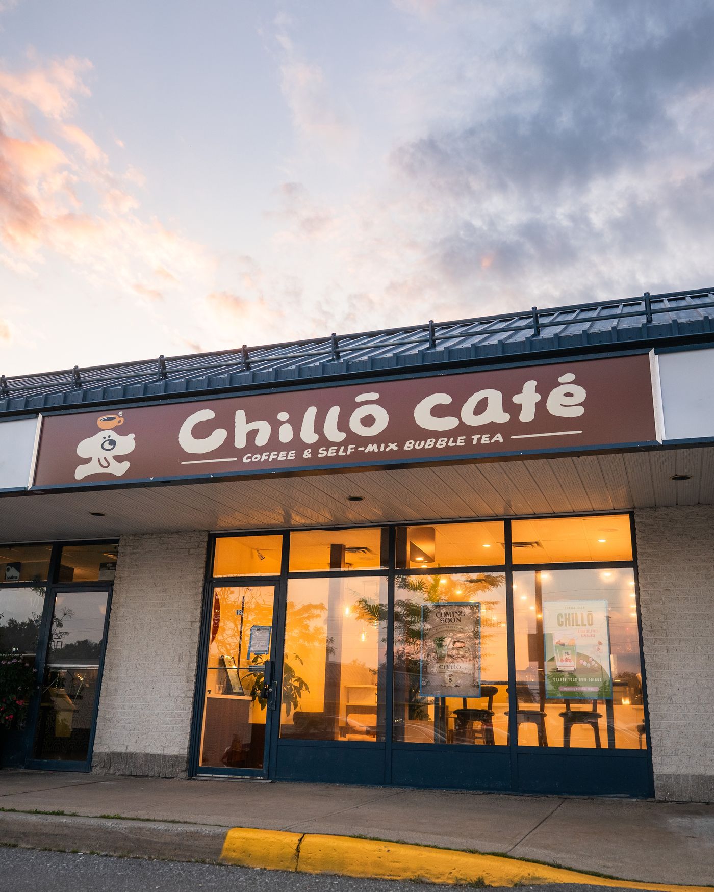 Chillō café storefront at dusk — 471 Hazeldean Rd, Castledean Plaza, Kanata