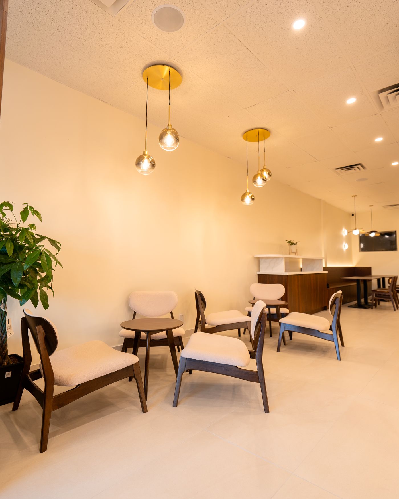 Seating and pendant lighting at Chillō café in Kanata